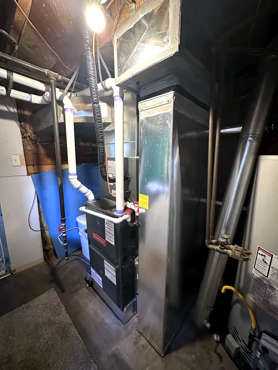 New Goodman furnace installed beside new return ductwork in a Denver metro home